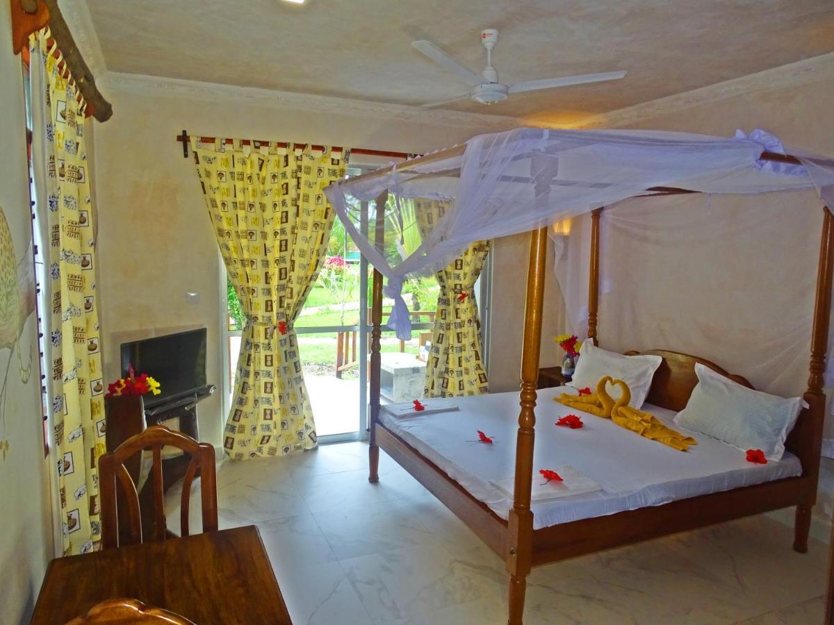 Diani-Paradise-Villas เดียนีบีช ภายนอก รูปภาพ